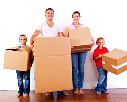 Packed office equipment ready for transport during a commercial move