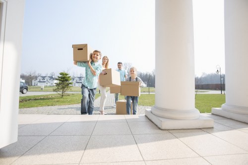 Moving crew handling stairs and access challenges