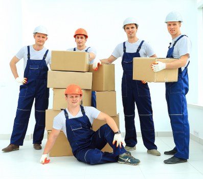 Packed boxes and household items ready for a Hampton Hill removal
