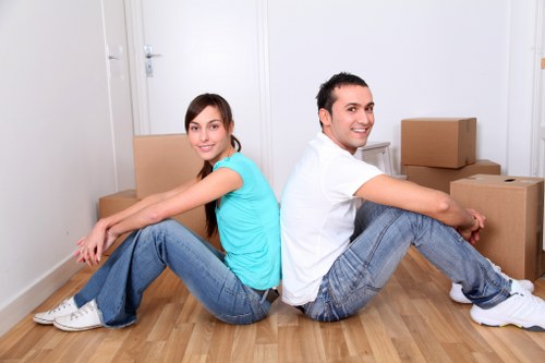Local movers handling furniture near residential streets in Hampton Hill