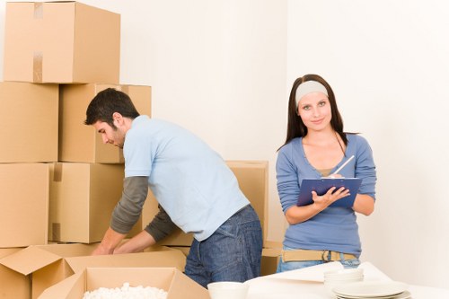 Packed boxes and furniture arranged inside a moving truck